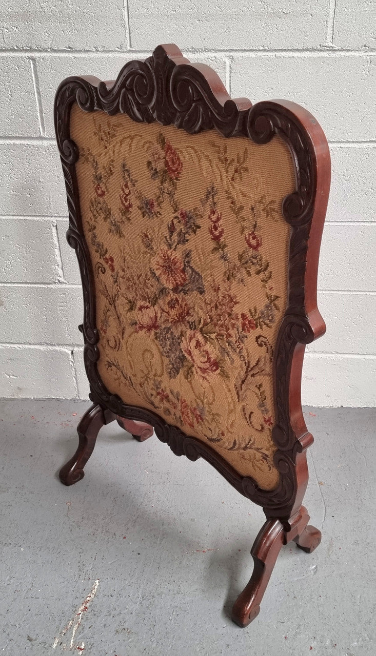 Attractive Carved Wooden Framed Fire Screen featuring Tapestry.  In good detailed condition.