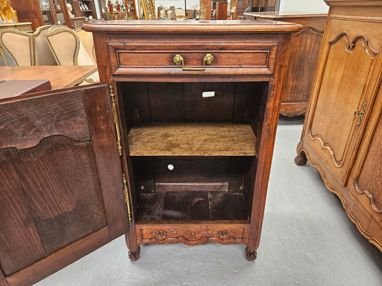 Louis 15th style oak 19th century cabinet with lovely brass hinges, handles & charming carving. Circ: 1860's. In good original condition.