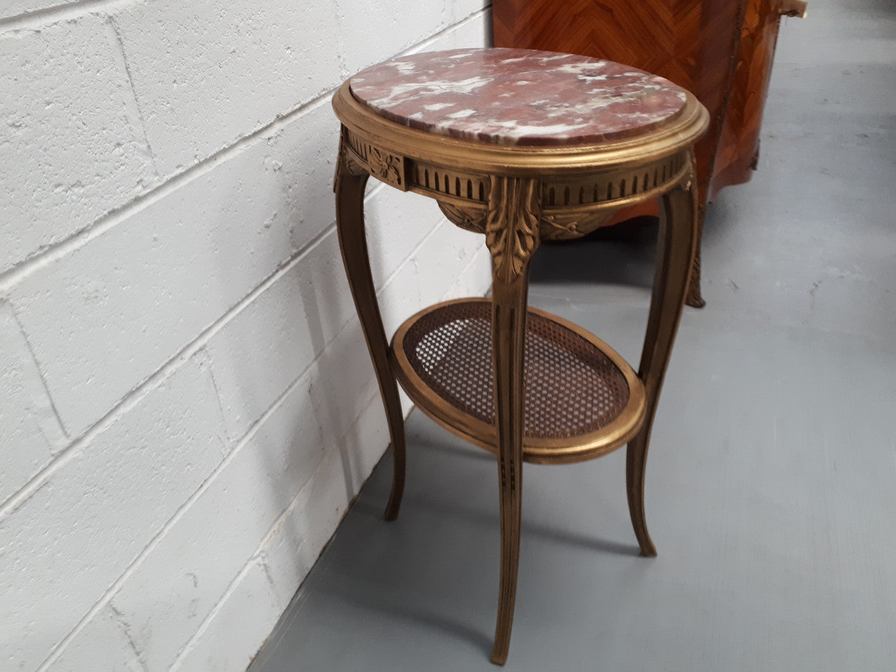 An exceptional & rare 18th century Louis XVI oval inset marble top & giltwood side table with original water gilding. In good restored condition. Circa 1790.