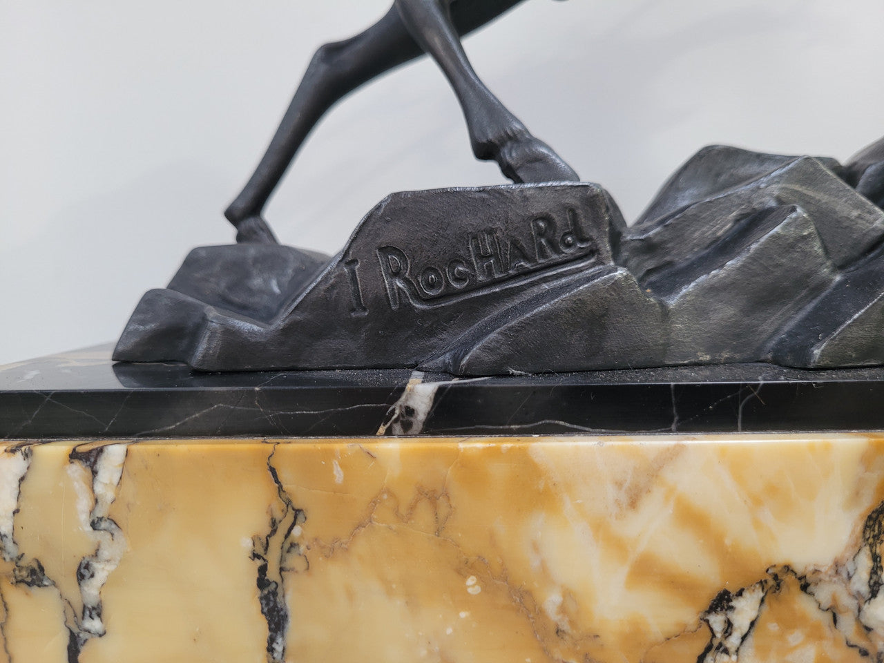French Art Deco bronzed spelter and marble"Fighting Stags" statue by renowned artist and sculptor "Irenee Rochard".