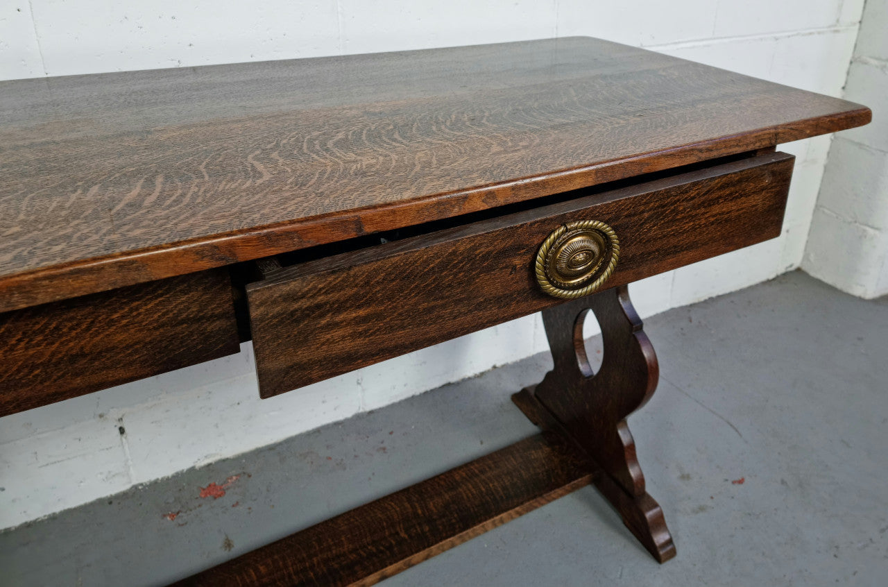 French dark Oak two drawer console table. It has loads of character and is in good original detailed condition.