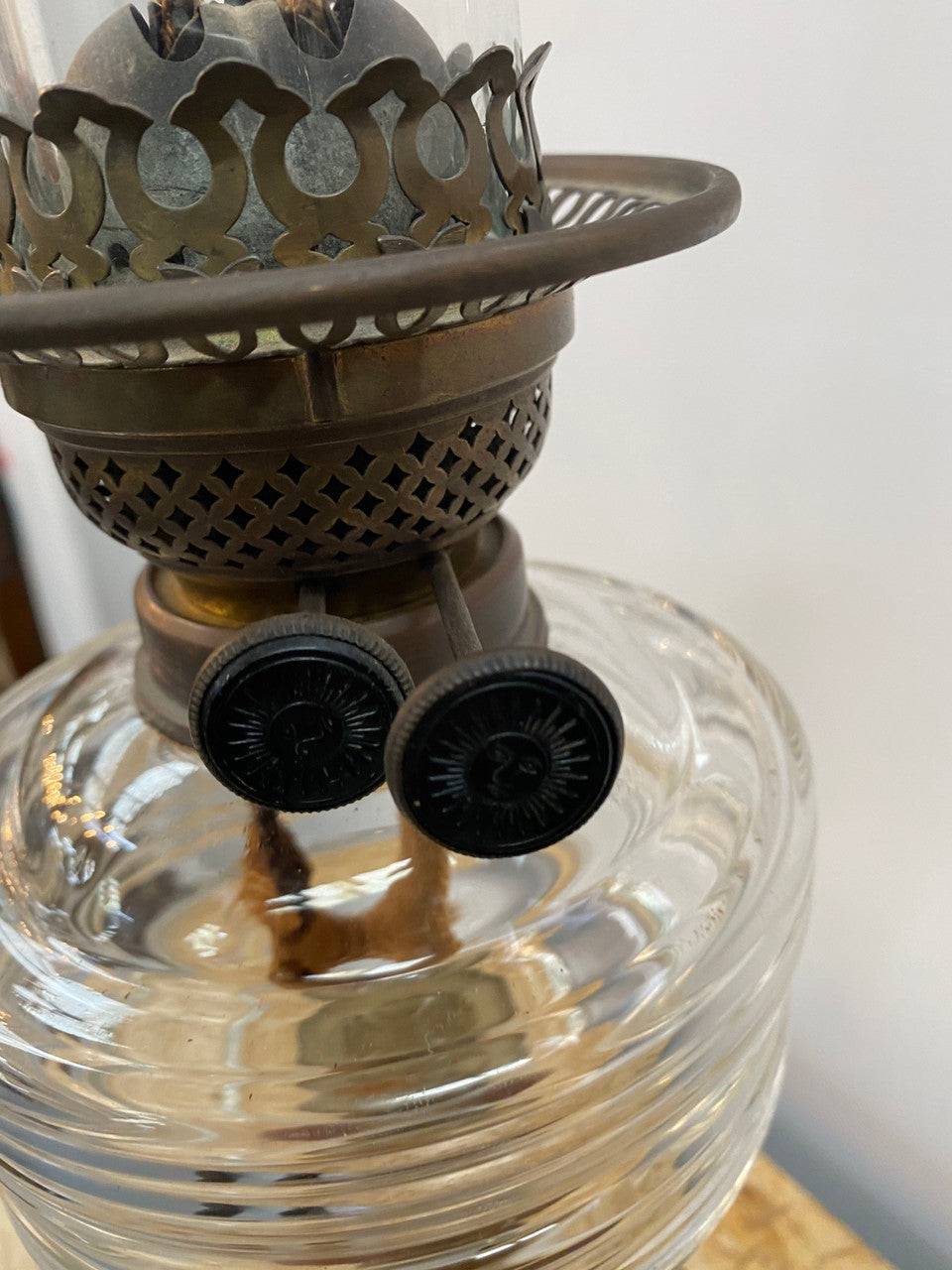 Edwardian ribbed glass kero lamp on a turned wooden base. Circa 1900's.