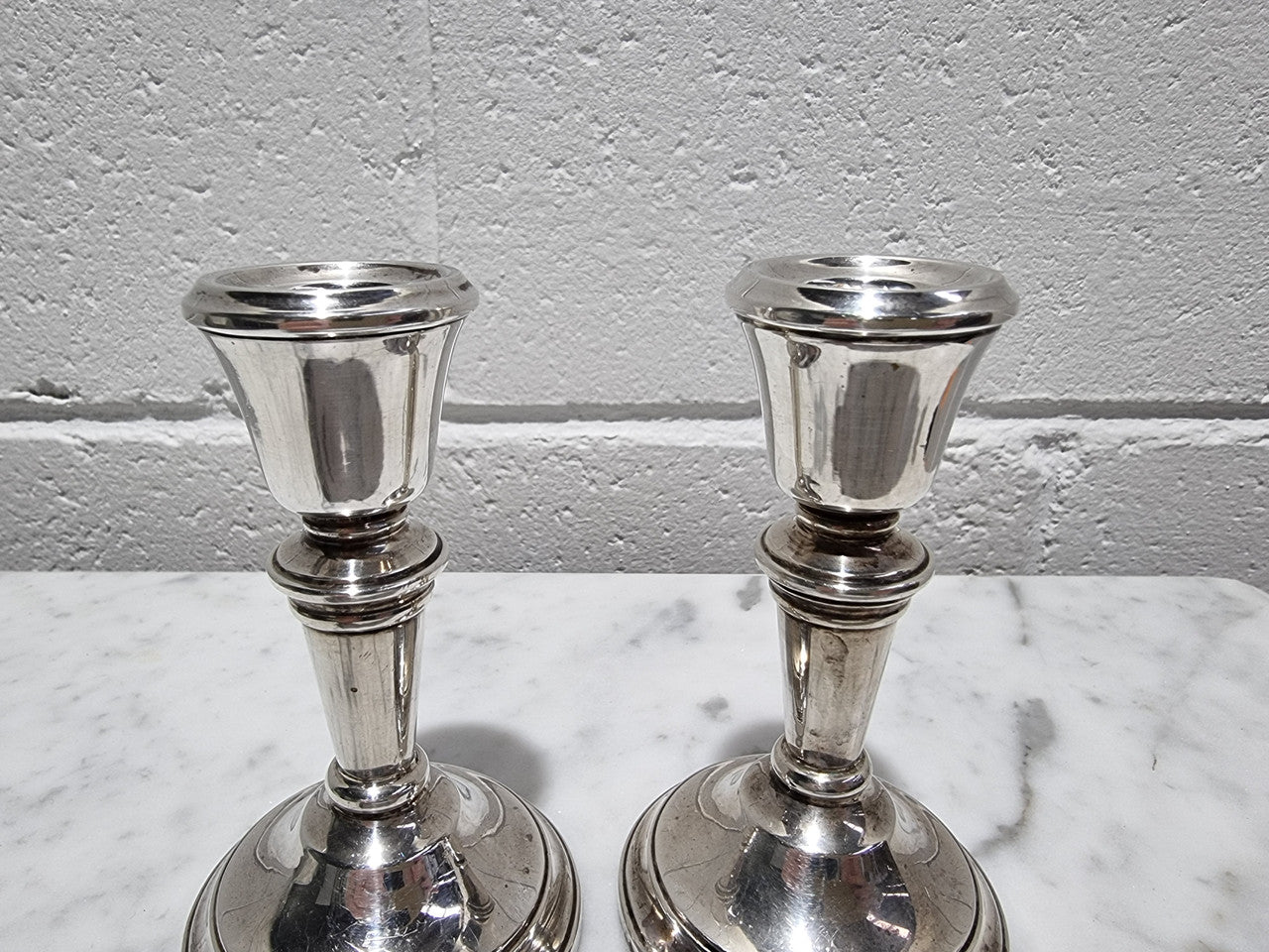 Pair of Birmingham sterling silver candlesticks date marks 1967. In good original condition, please view photos as they help form part of the description.