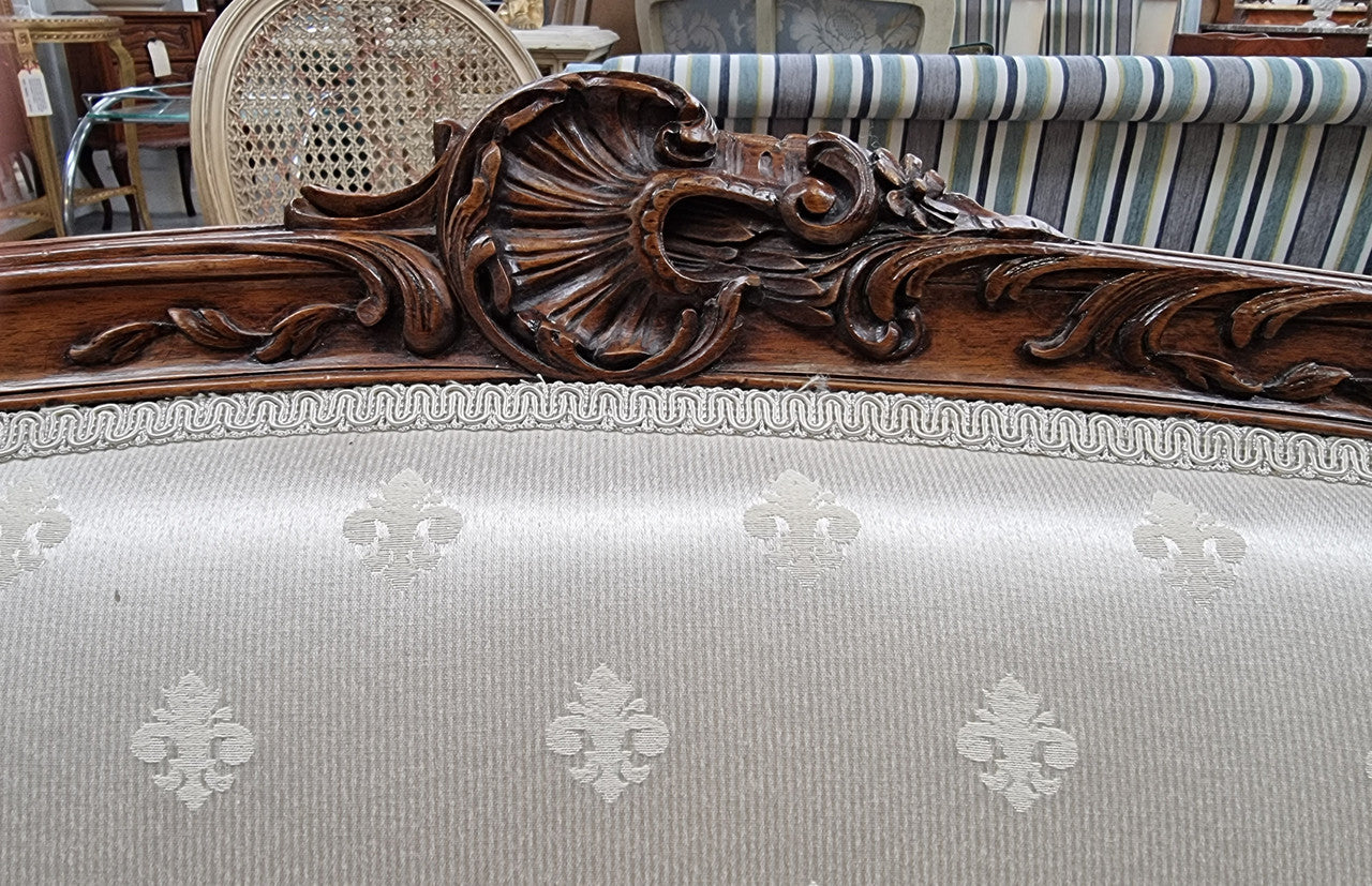 Pretty French Louis XV style small Walnut settee with very good upholstery. Sourced from France and in good original condition, please view photos of the upholstery as it helps form part of the description.