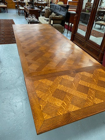 French Oak Renaissance style extension table. Extension leafs pull out either side and each leaf measures 54 cm. This allows you to use the table at three different sizes depending on your needs.