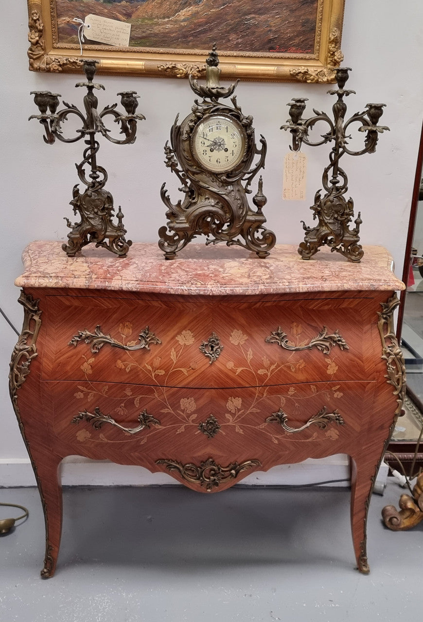 Stunning Louis XV style marquetry inlay marble top two drawer commode. It has decorative ormolu mounts and beautiful marble top. In good original detailed condition.