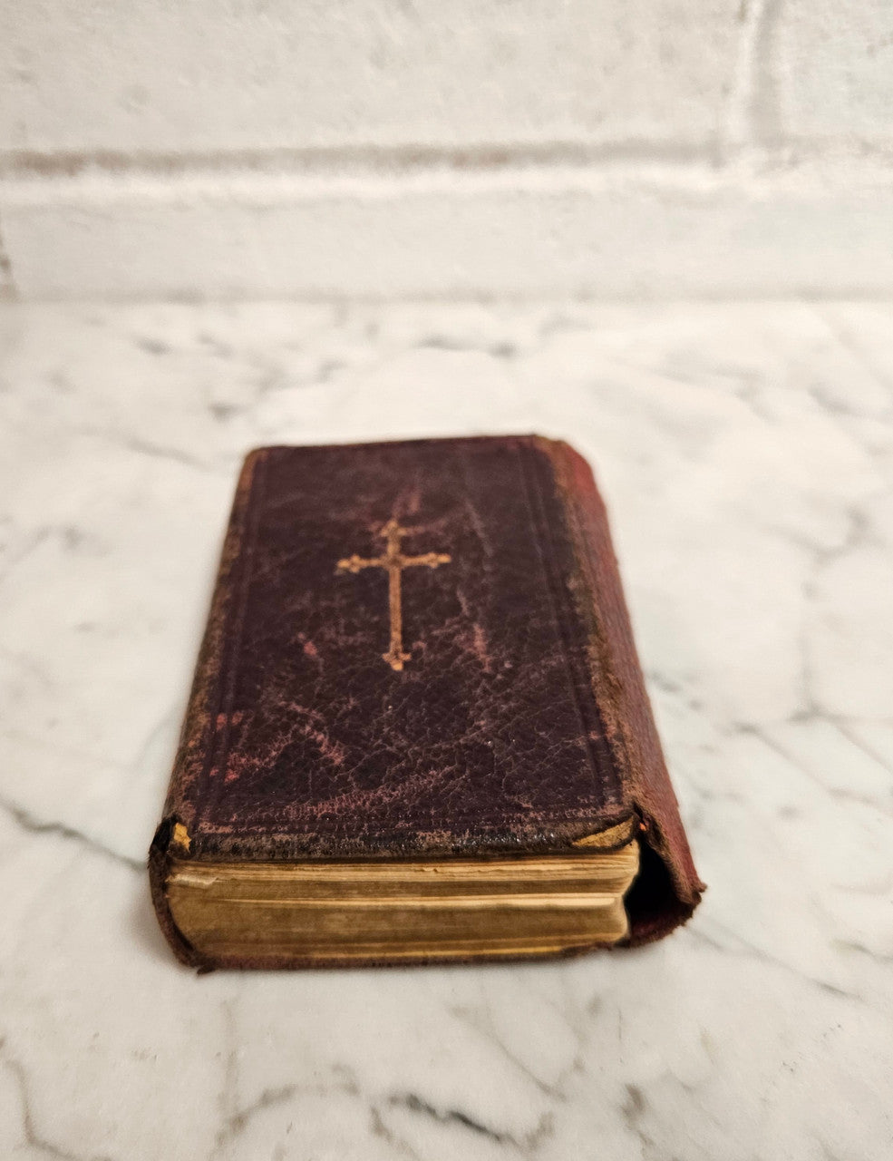 Very small antique leather bound Key of Heaven Manual of Prayer Book printed by M H Gill & Son Dublin. Condition commensurate with age.
