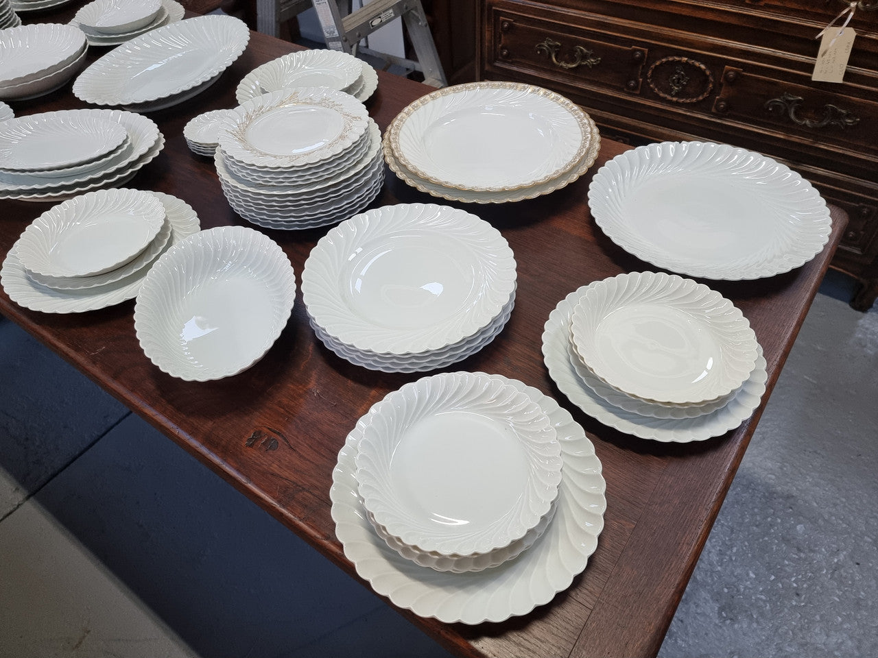 Limoge "Haviland" large white part dinner service. Includes some white service with gilt decoration. Although most items are in good condition please note two plates do have small chips. We are able to supply more photos on request.
