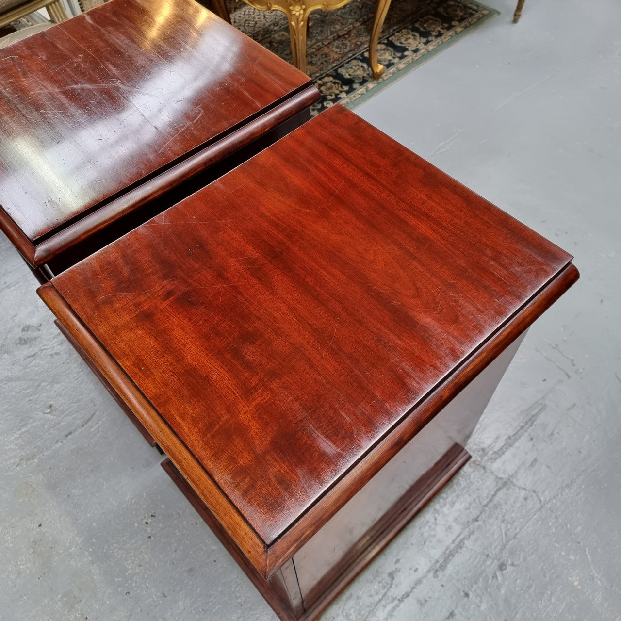 Unique pair of Victorian mahogany bedsides with one fixed shelf. Sourced locally and in good original detailed condition.