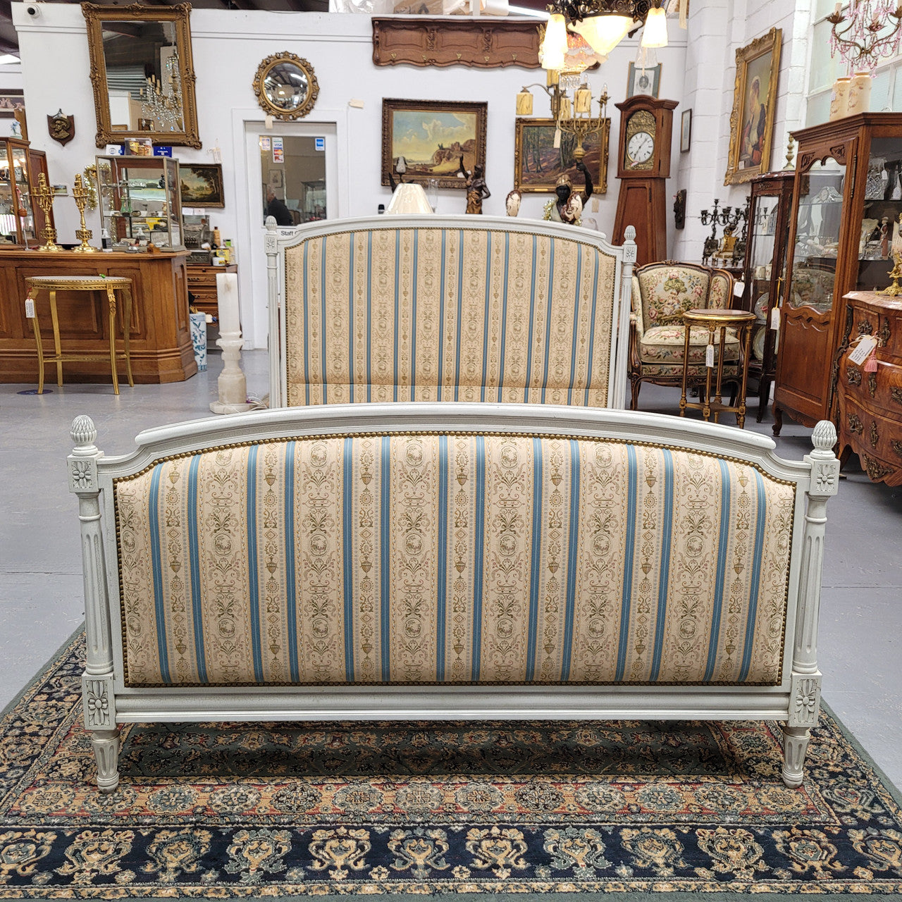 French Louis 16th style double bed and rails with original crackle paint. It also has good quality upholstery. Bed comes complete with custom made slats. Just place your mattress on top. Sourced from France and in good original detailed condition.