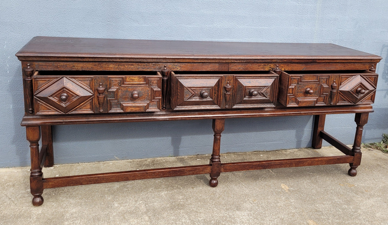 19th Century French Oak Henry the 2nd style console/side table/ TV unit with two drawer with beautiful carvings. It is in good original detailed condition.