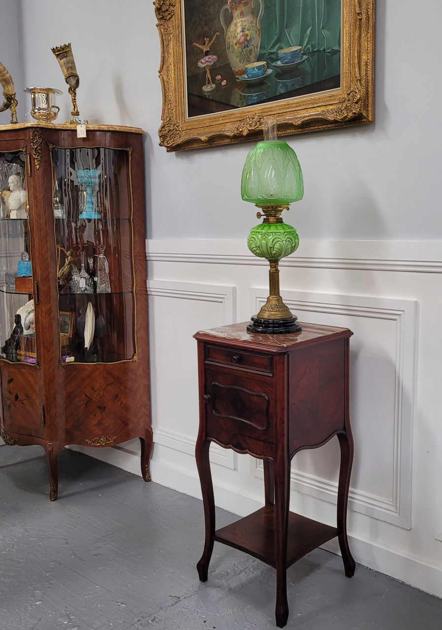 French Rosewood inset marble top single bedside cabinet with one drawer and one cupboard on elegant legs. Would also make a practical and stunning table lamp. It is in good original detailed condition.