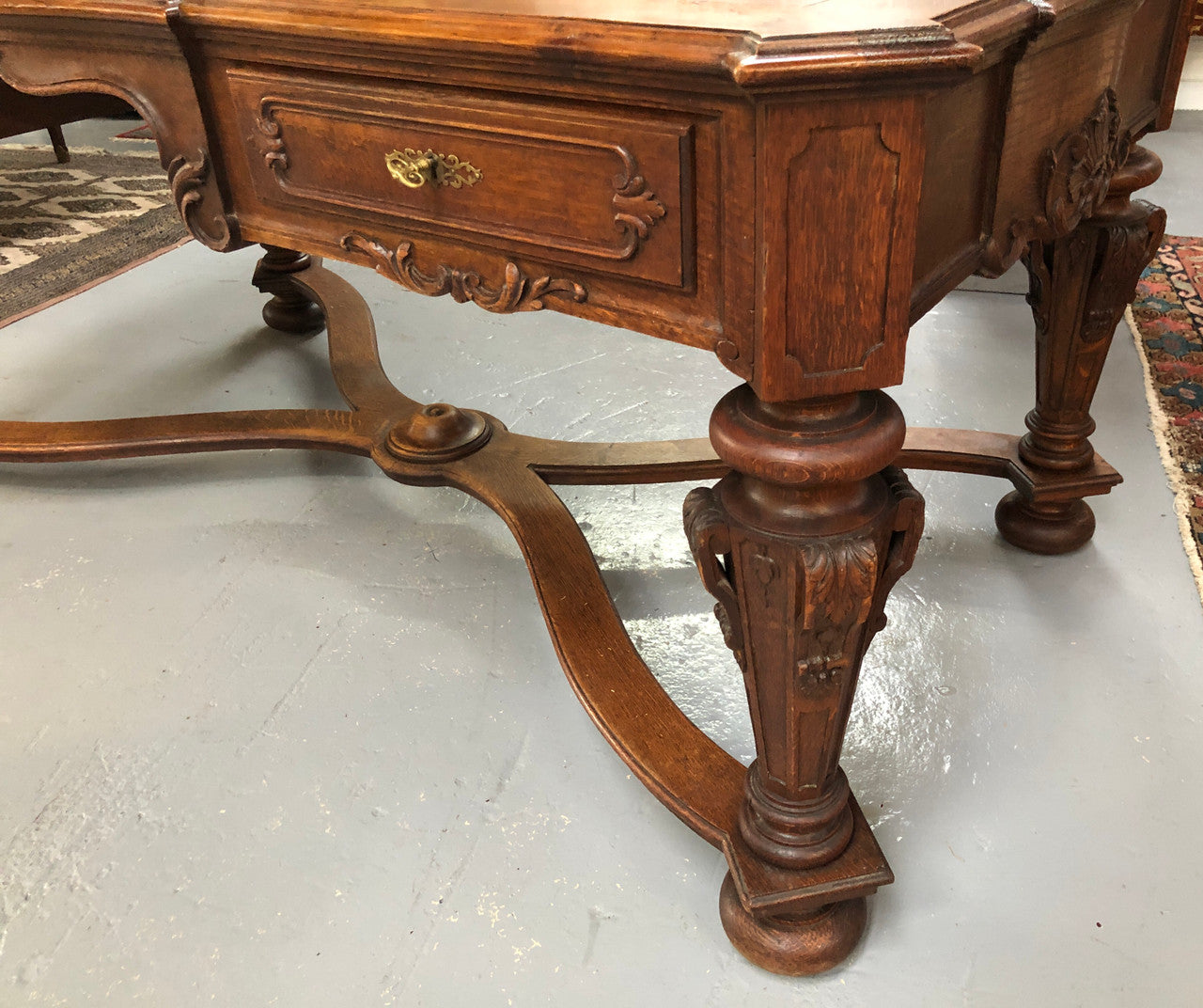 Beautifully carved 19th century French oak Bureau Plat. With a lovely parquetry top and two drawers and decorative carved legs this piece is definitely one to look at . In good original detailed condition.