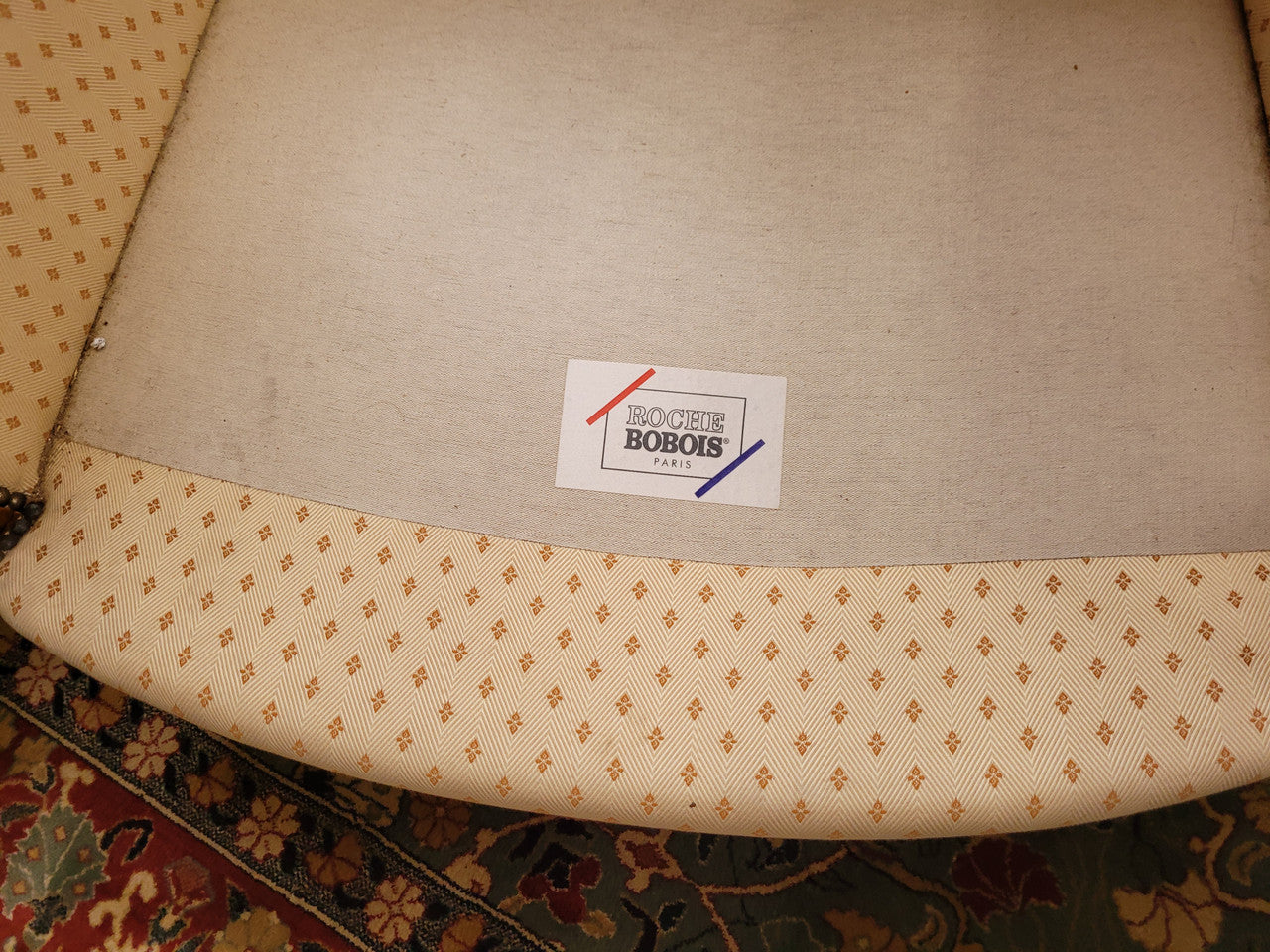 Pair of Louis XVI style 19th Century walnut upholstered Bergère chairs with loose cushions. They have been sourced from France and is in good original detailed condition. The fabric is in good original used condition, please view photos as they help form part of the description.