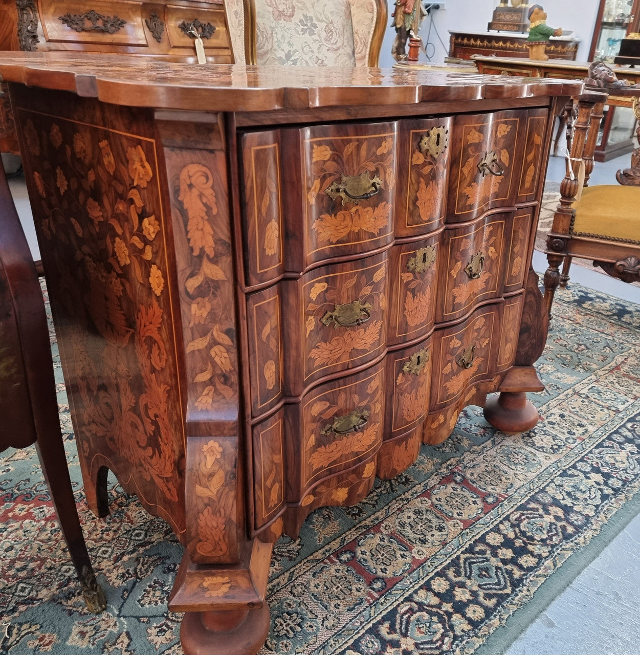 Very Fine highly decorative 18th century Dutch 3 drawer commode. It retains its original brass hardware and Escutcheons. In very good original detailed condition.