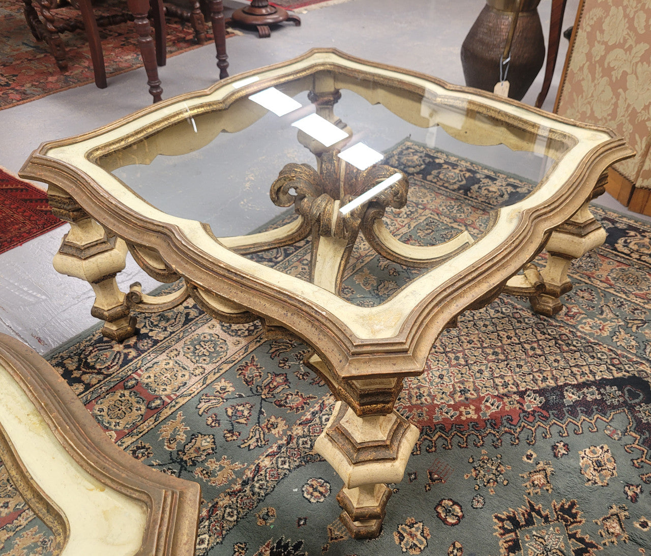 One of a pair of stunning Vintage Italian painted Florentine coffee tables. Very decorative and hard to find. Price of $1695 is for each table.