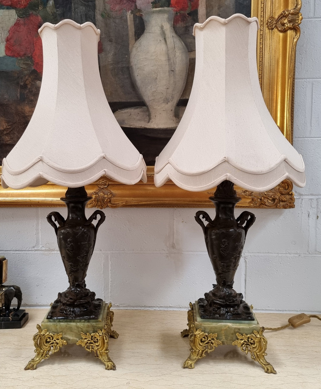 Pair of decorative Antique French gilt bronzed metal and marble table lamps. In good original detailed working condition.