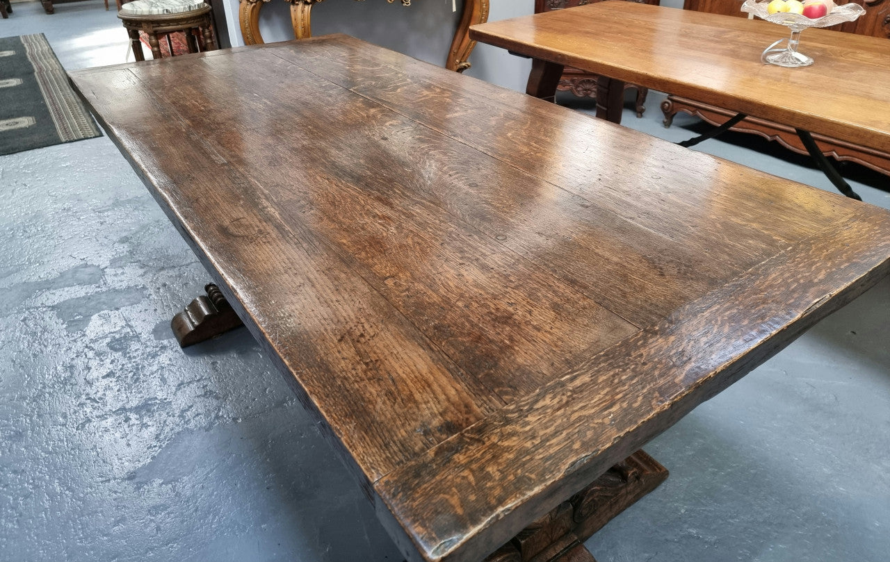 A beautifully carved 19th Century French Oak farmhouse table with a "bulbous base". It is in very good original detailed condition.