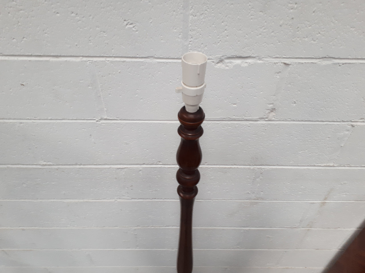 Antique Walnut standard lamp, with foot switch and in good working order condition.
