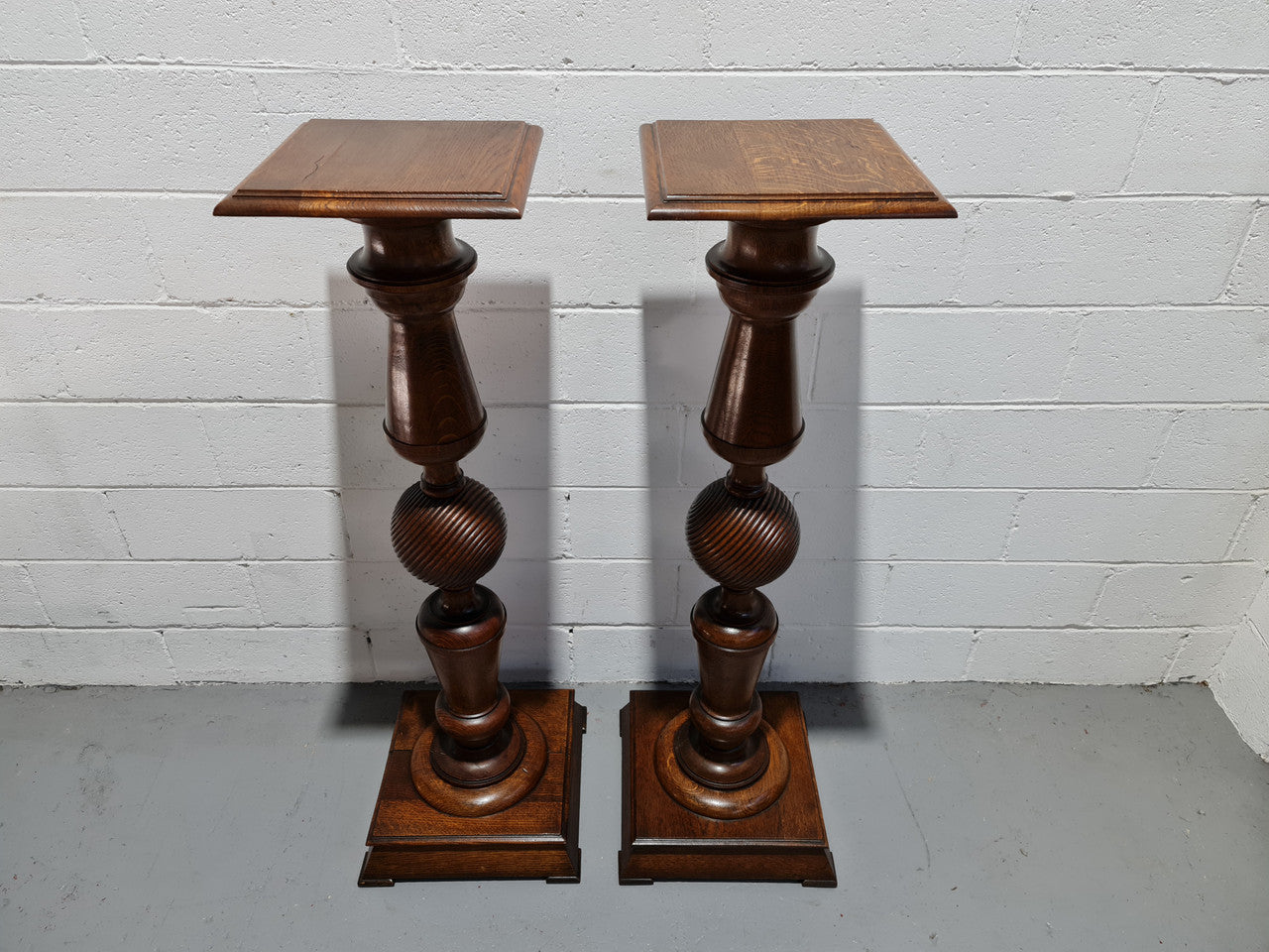 Pair of unique French Oak pedestals, beautifully constructed and turned with decorative carving. Circa 1880. In good original detailed condition.