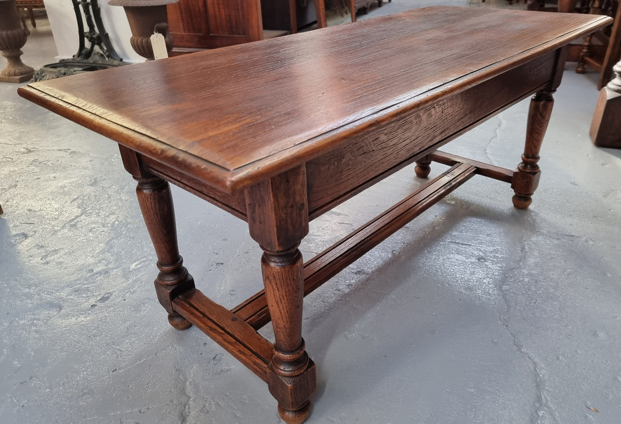 Beautiful French oak 2 drawer coffee table. In good original detailed condition.
