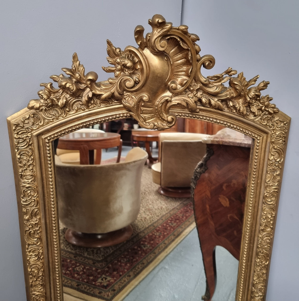 Late 19th Century French Louis XV style carved gilt wall mirror. Sourced from France and in good original detailed condition.