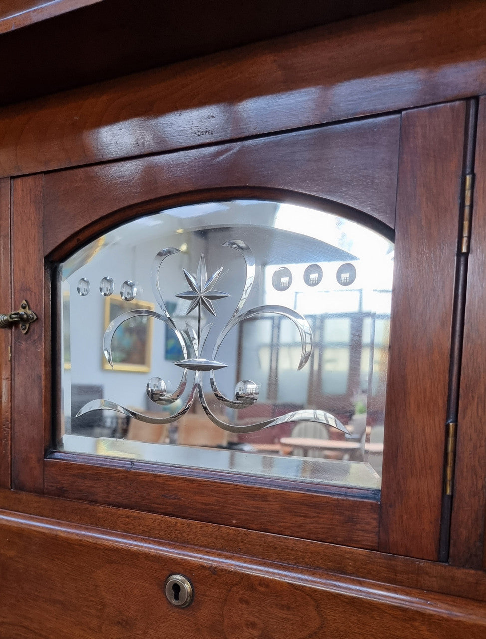 A 19th Century Scottish Mahogany tall boy/ chest of six drawers with small cabinet section at the top. Beautiful carvings and easily comes apart into three sections making transport f0r moving into place easy. In good original detailed condition.