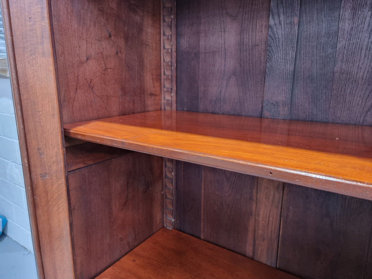 Grand French Mahogany Empire two door bookcase. It has beautiful glass doors and has three fully adjustable shelves. It has been sourced from France and is in good original detailed condition.