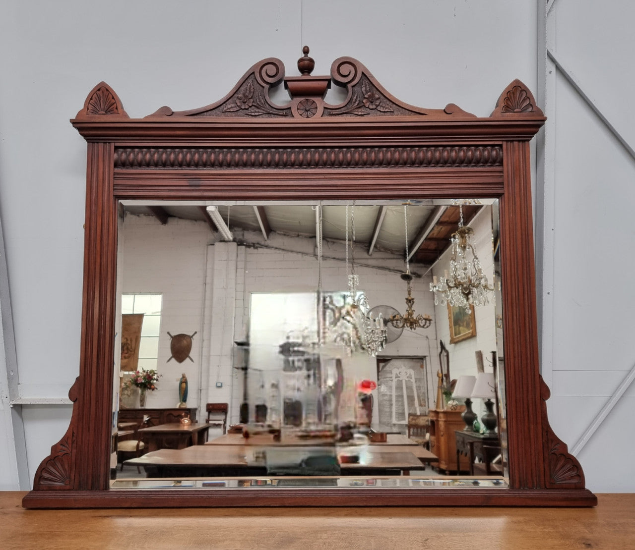 Beautiful Walnut nicely carved Edwardian mantle mirror. In good original condition and still has its original mirror.