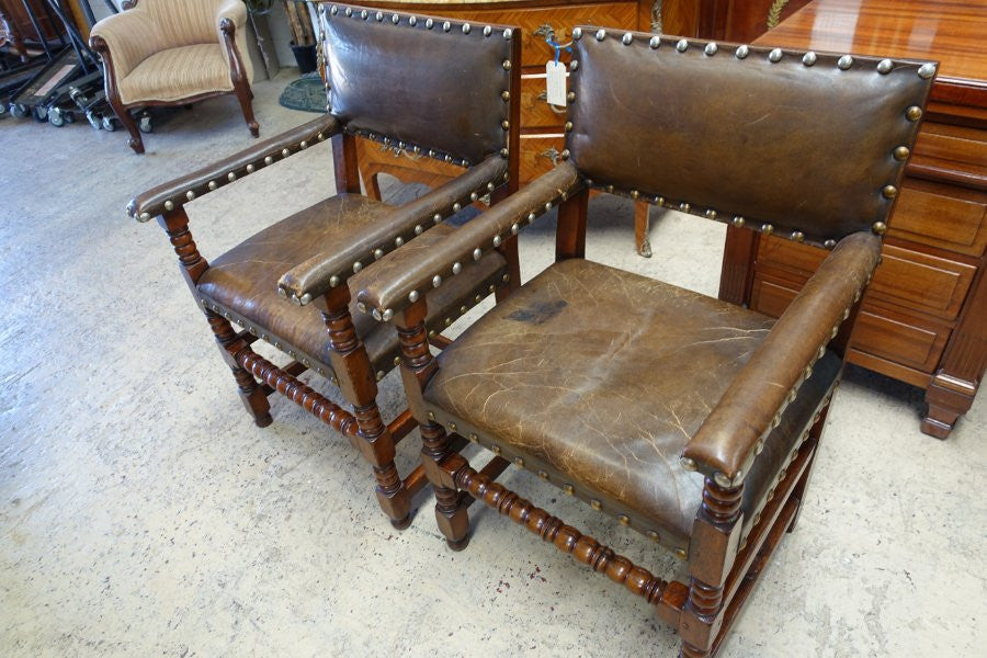 Here we have a fabulous set of six French oak rustic leather dining chairs with two carvers. Chairs are upholstered in brown leather and are very comfortable and solid. Is in very good original condition.