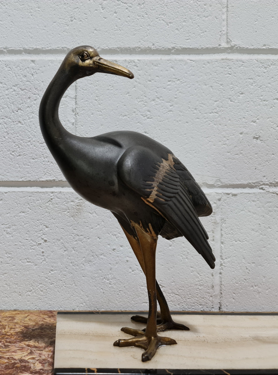 Fabulous French Art Deco cold painted spelter Ibis birds on a stylized Art Deco marble base. Signed "Rochard" circa 1930's. In good original detailed condition.