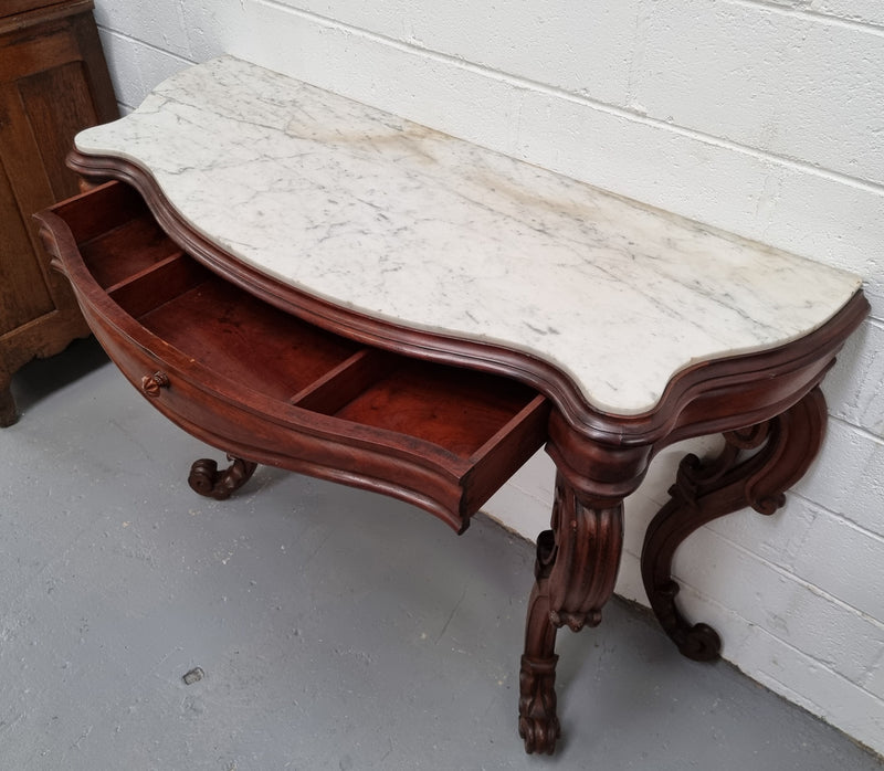 19th Century French Mahogany marble top console table. Louis XV style with white marble top and single drawer. Sourced from France and in good original detailed condition.