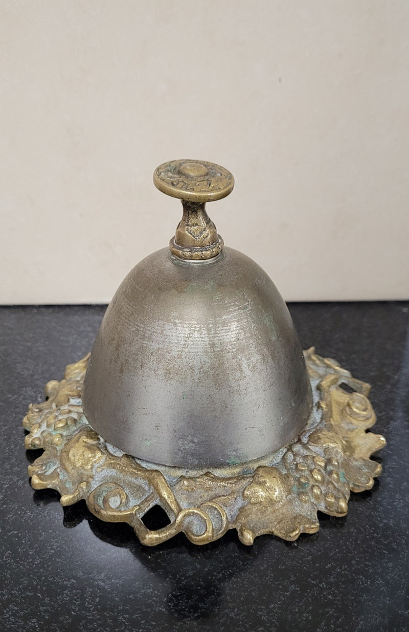 Vintage brass and white metal stone counter bell with a great ring, Circa 1920's. It is in great original condition. Please see photos as it forms part of the description.
