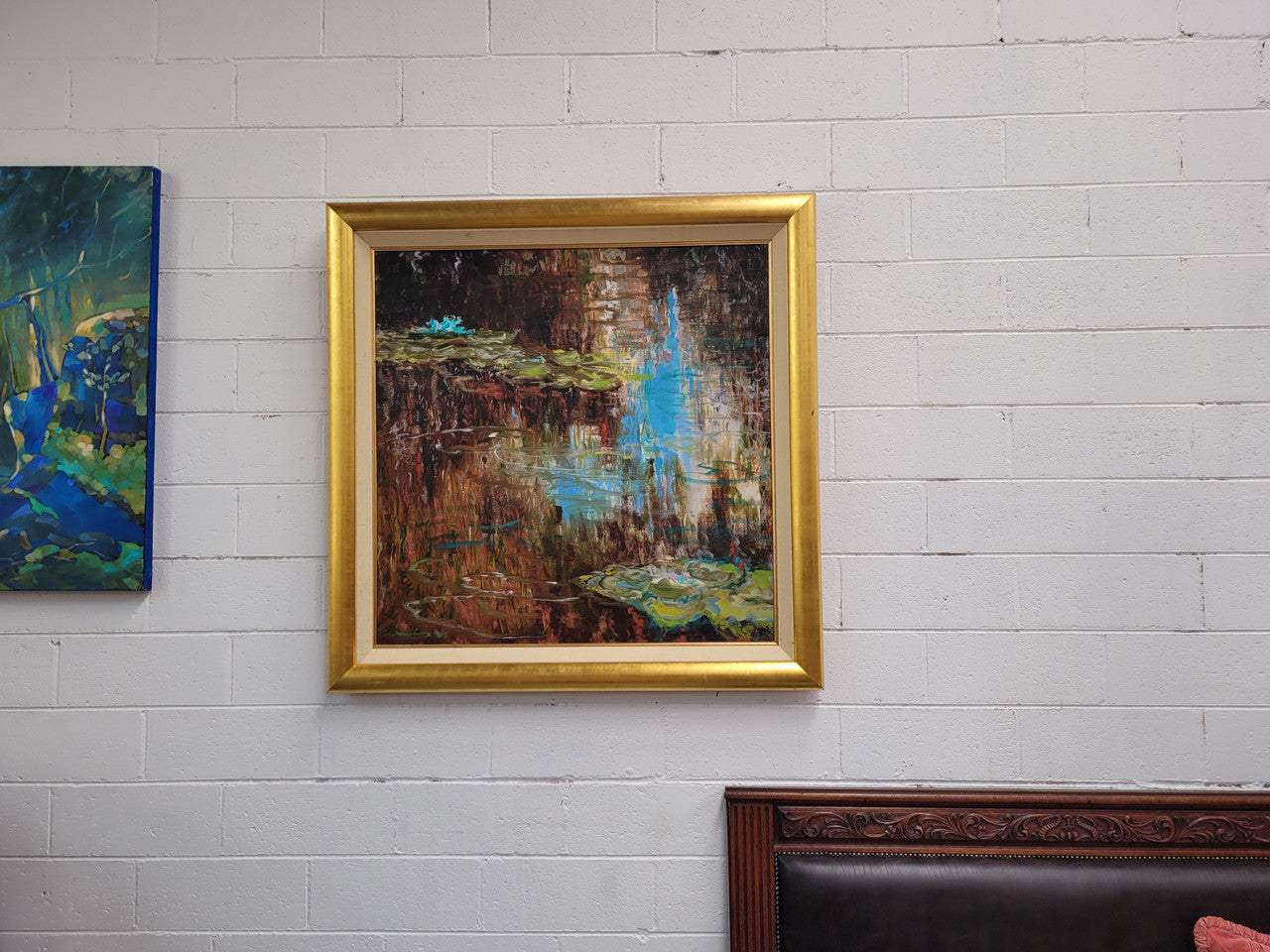 A beautiful Framed oil on canvas in vibrant colours and framed in a lovely gold frame. This piece is signed by artist John Cumming from "The Mill Gallery" and still has its original gallery card as shown in picture. It is in good original condition.