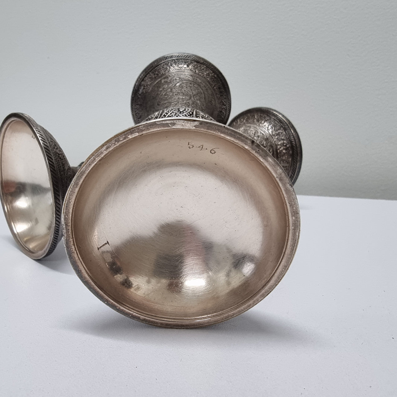 Pair of antique Indian silver plated vases with markings 'I, 546'. Sourced locally. They are in good original condition.