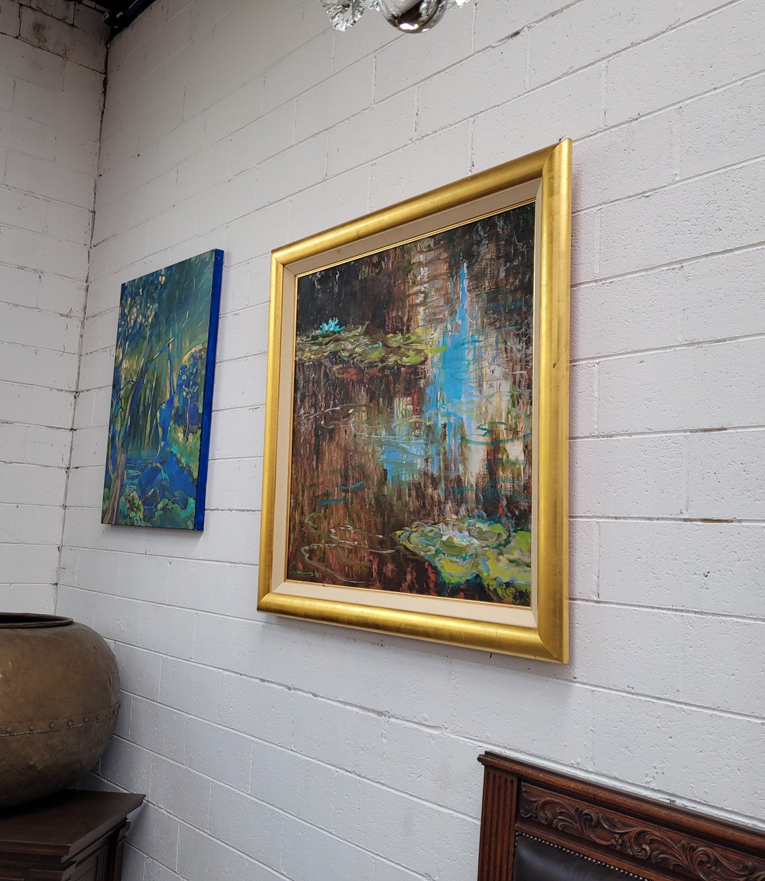 A beautiful Framed oil on canvas in vibrant colours and framed in a lovely gold frame. This piece is signed by artist John Cumming from "The Mill Gallery" and still has its original gallery card as shown in picture. It is in good original condition.