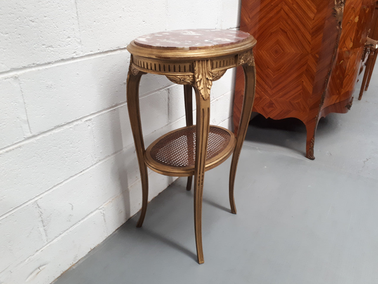 An exceptional & rare 18th century Louis XVI oval inset marble top & giltwood side table with original water gilding. In good restored condition. Circa 1790.