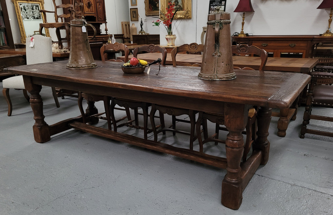 Amazing 2.65 meter French Elm Refectory dining table with loads of rustic charm. This table has been sourced from France and can comfortably seat ten people. It is in good original detailed condition.