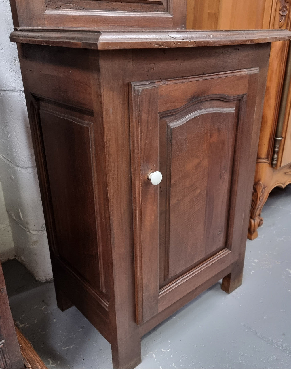 Lovely entrance piece with shelf and single door cupboard, topped with a section for hanging jackets, hats etc. Sourced from France and in good original detailed condition.