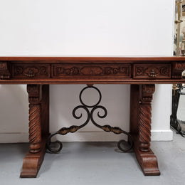 Amazing French Oak Spanish style console table with three drawers and decorative carvings. This piece is in great original condition and has been sourced from France. Circa 1930's.