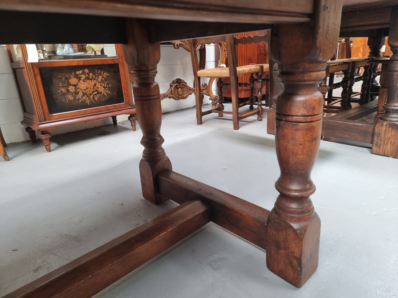 Vintage French Oak stretcher base farmhouse table. It is in good original condition.