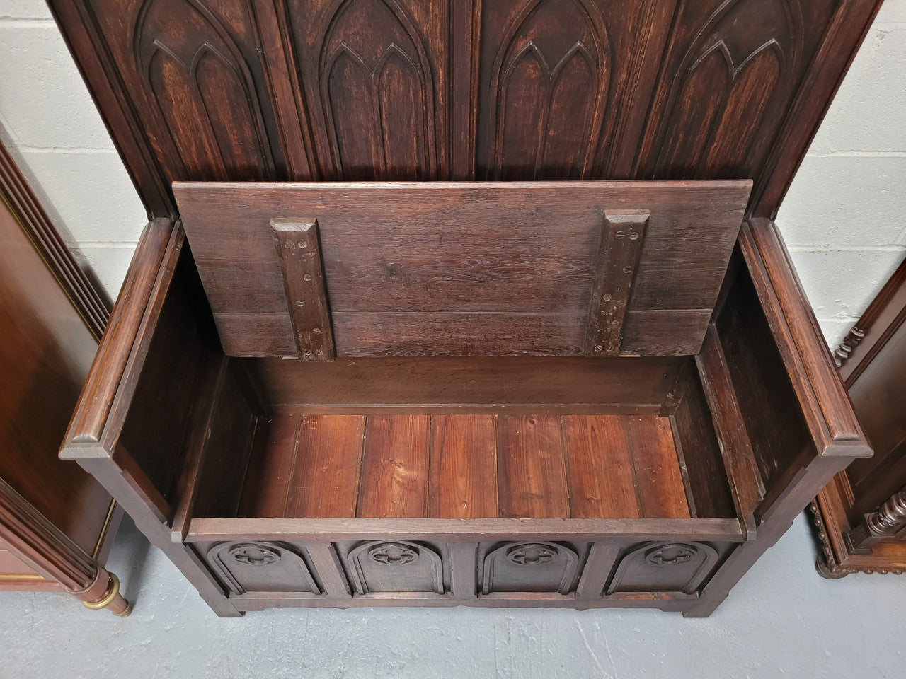 French Oak 19th Century gothic style high backed hall seat. Amazing detailed carving and is good detailed condition.