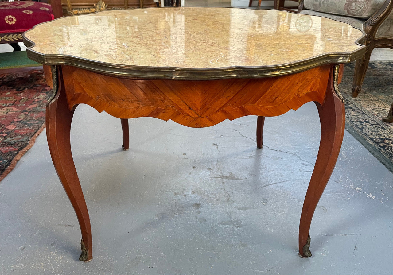 French Louis XV style marquetry inlaid marble top coffee table. In good original detailed condition.