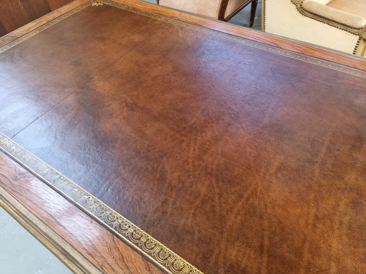 Beautifully fully restored French Antique Rosewood partners desk with beautiful ormolu detail and lovely tooled new leather top. There are three functioning drawers on one side for all your storage needs.