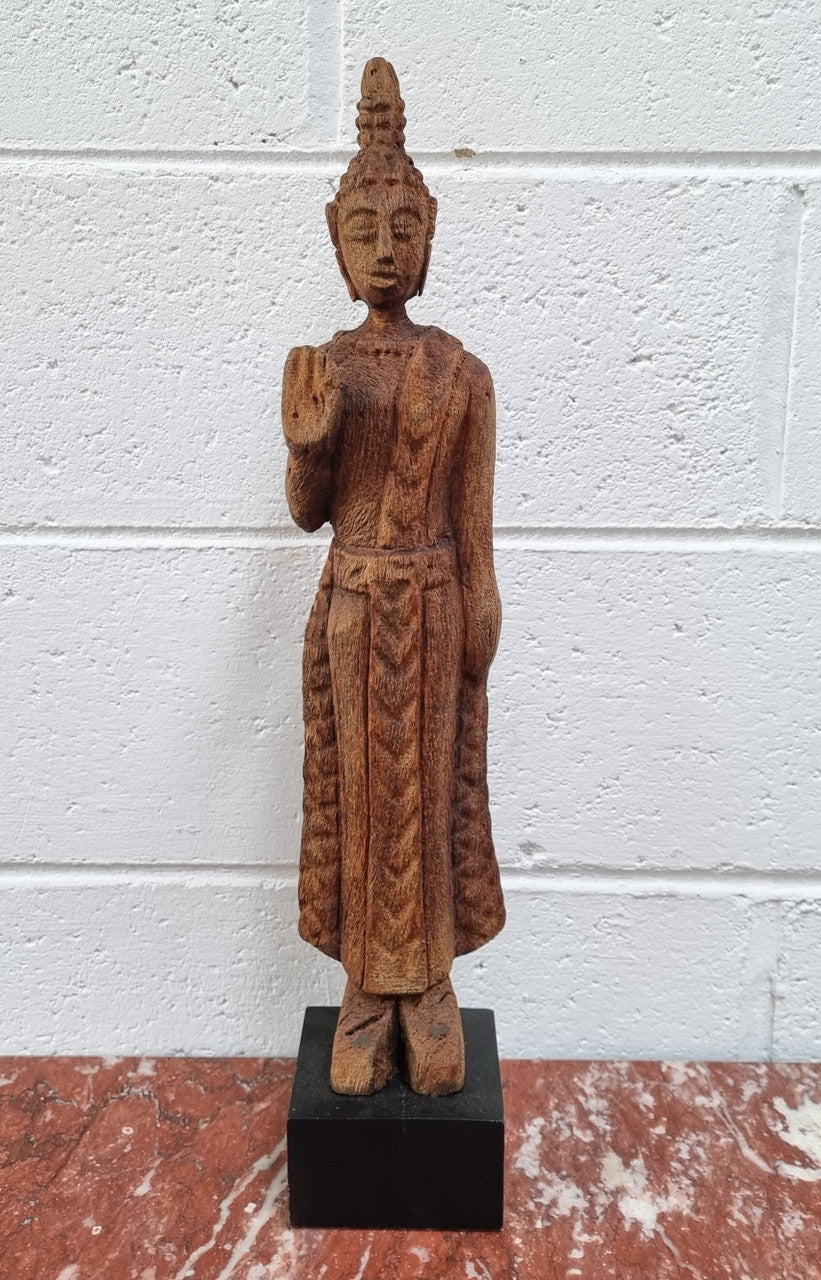 Antique Sukhothai Style Thai carving of a standing Buddha. In good original detailed condition.