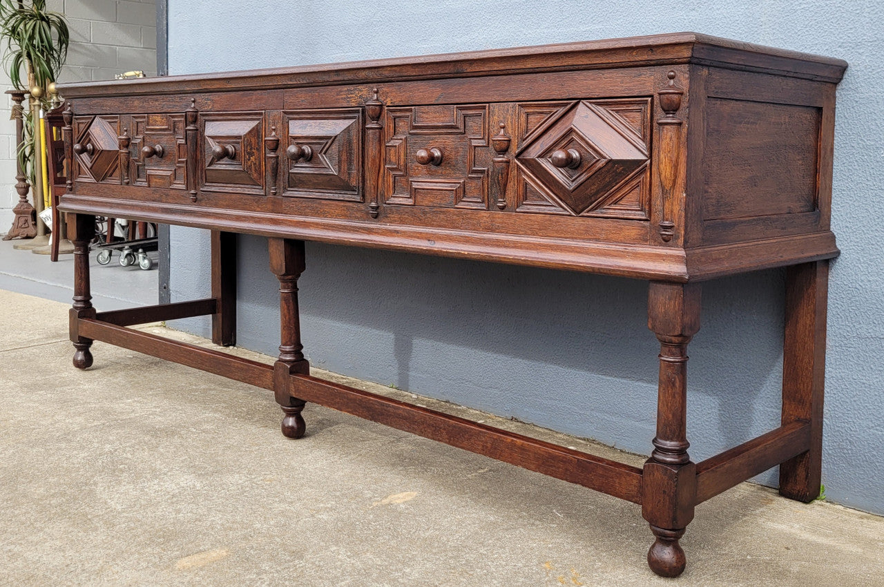 19th Century French Oak Henry the 2nd style console/side table/ TV unit with two drawer with beautiful carvings. It is in good original detailed condition.