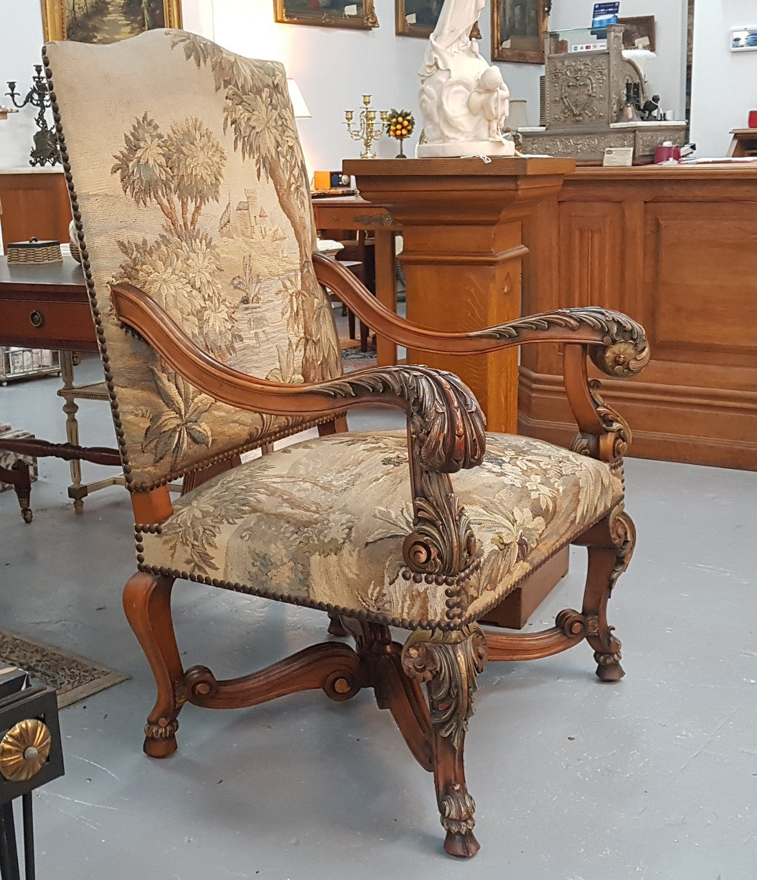 A sensational French walnut carved chair