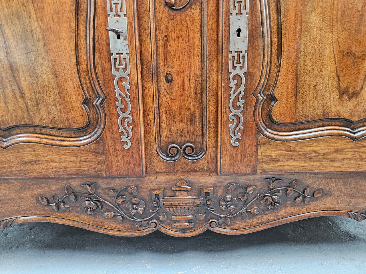 Attractive French Walnut Louis XV style two door two drawer sideboard featuring beautiful carving. Circa: 1930's. It has been sourced from France and it is in good original detailed condition.