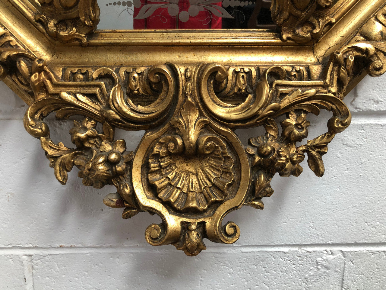 Early 19th Century gilt cushion mirror with acid etched floral pattern. In good condition. Please note original mirror does show some spotting commensurate with its age. Circa