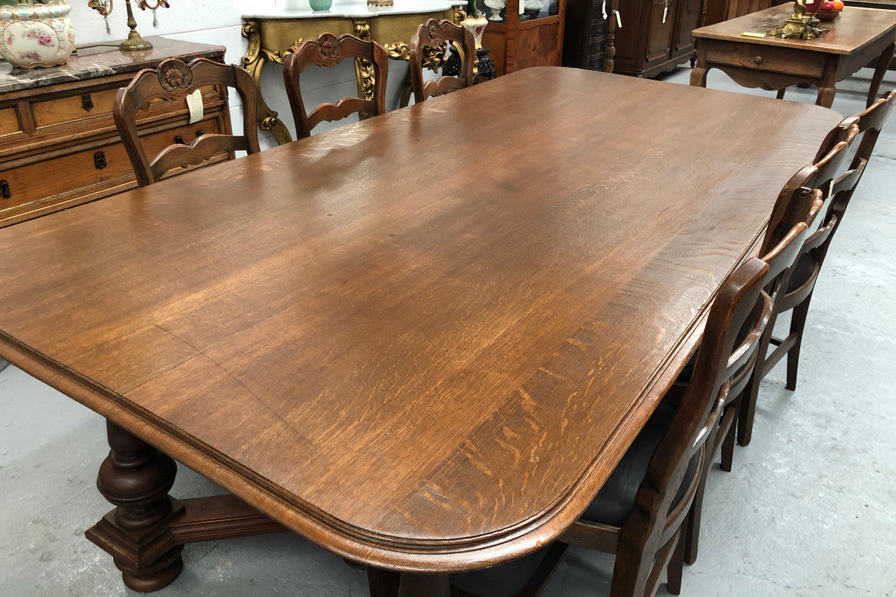 Large French Oak 19th century Henry II style dining table. It can seat 8 very comfortable and being very wide at 119 cm there is plenty of space to sit 10. In good original detailed condition.
